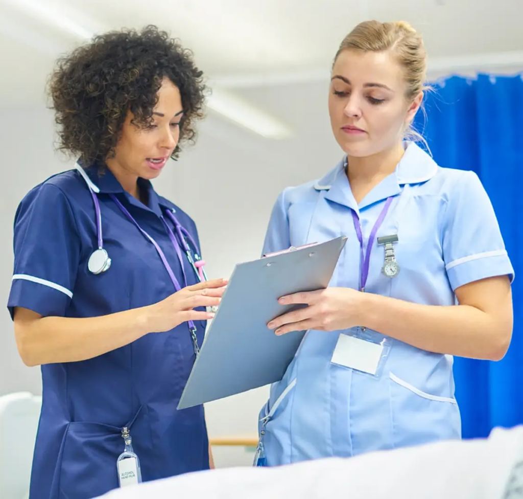 Nurses examining chart photo